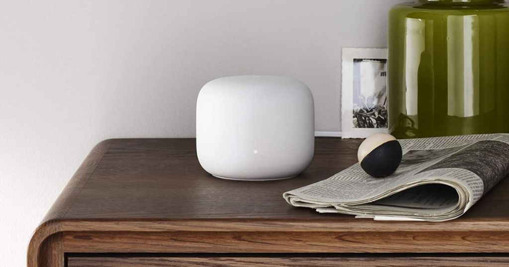 white mesh Google Nest sitting on dresser