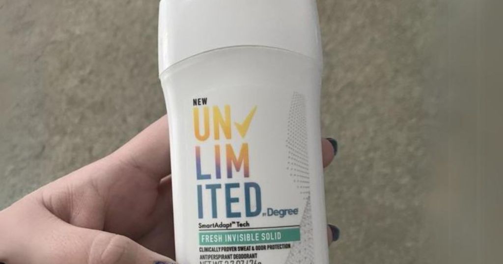 hand holding a Degree Unlimited deodorant