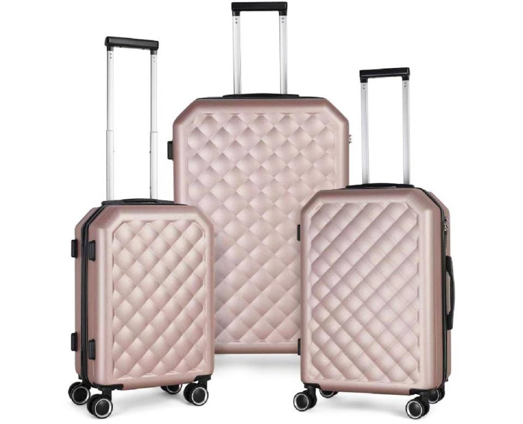 light pink quilted luggage set