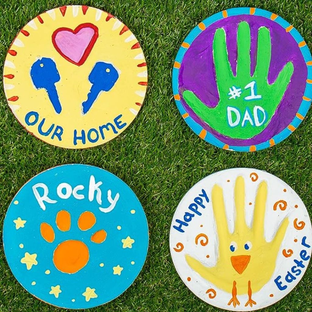 Creative Roots Create Your Own Handprint Stone Kit shown with 4 different designs 