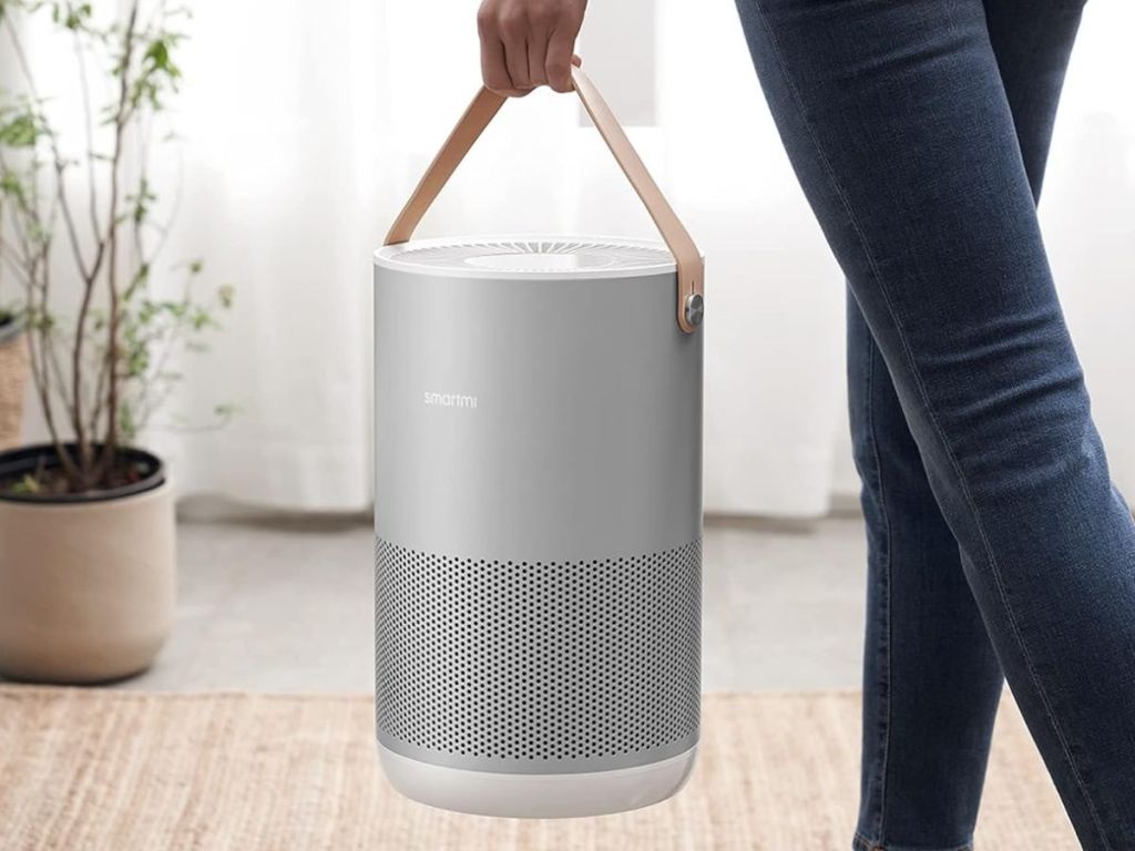 Smartmi Air Purifier being carried by handle