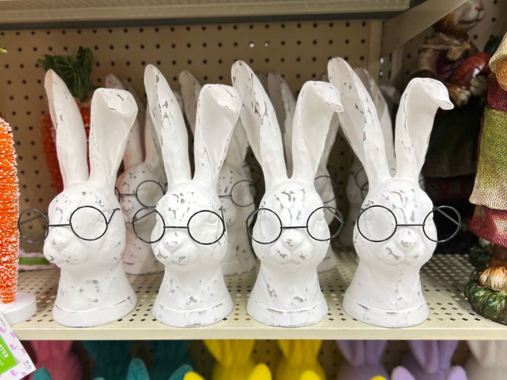 large Easter Bunny heads wearing glasses on shelf