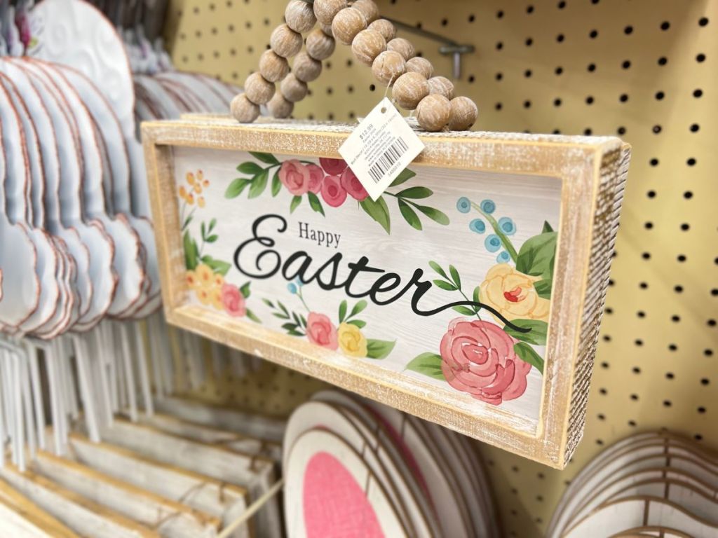 wooden Happy Easter wall or door sign hanging on shelf