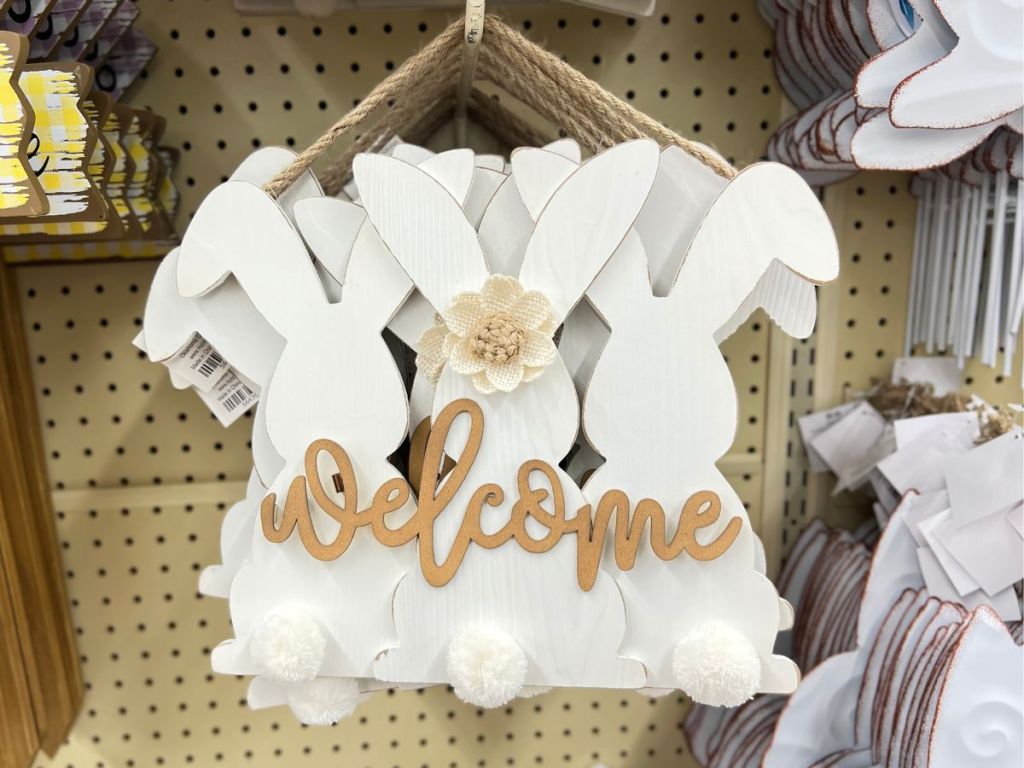 wooden Easter sign with 3 white bunnies with cottontails that says Welcome