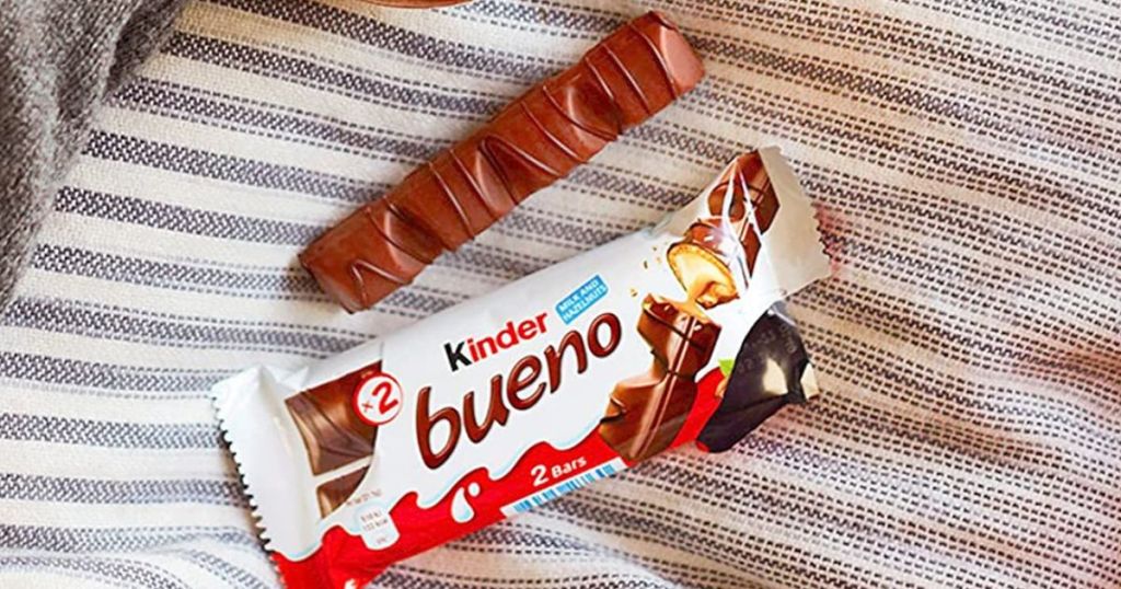 Kinder Bueno package with open chocolate bar next to it