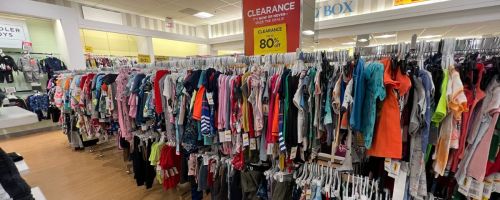 racks of kids clothes on clearance at Kohl's