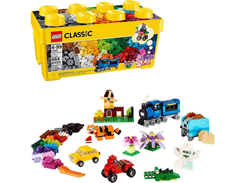 A box of LEGO with LEGO bricks surrounding