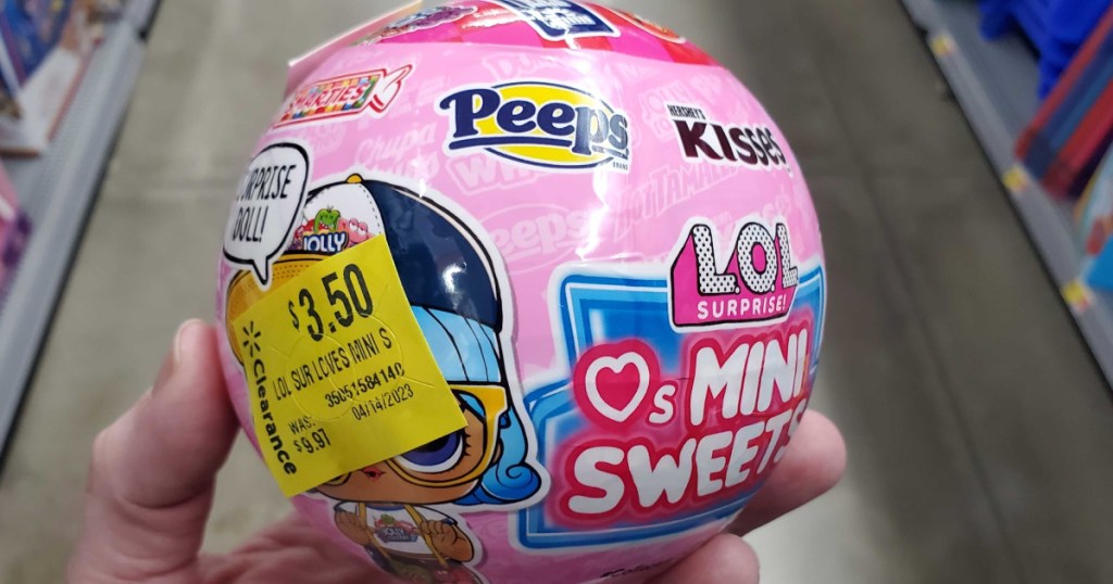 LOL Surprise Loves Mini Sweets Dolls ball in woman's hand at the store