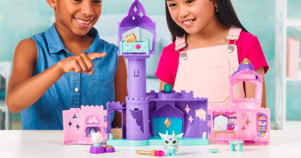 girls playing with Magic Mixies Mixlings Magic Castle Set
