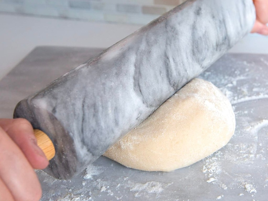 marble rolling pin rolling out dough