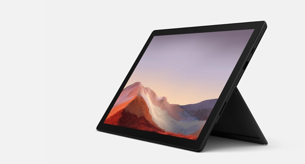 Microsoft tablet with a display of mountains on the screen