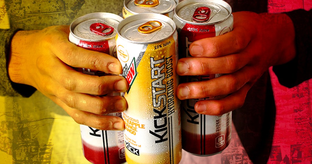 hands holding multiple cans of Mountain Dew Kickstart