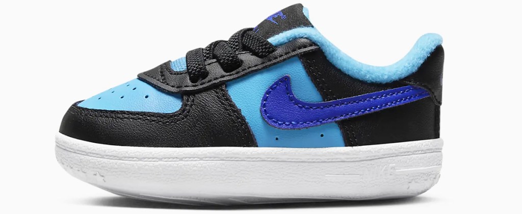 black and blue nike baby shoe