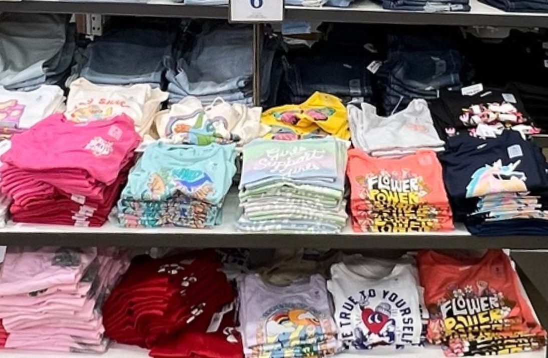 Table of graphic tees for girls at Old Navy