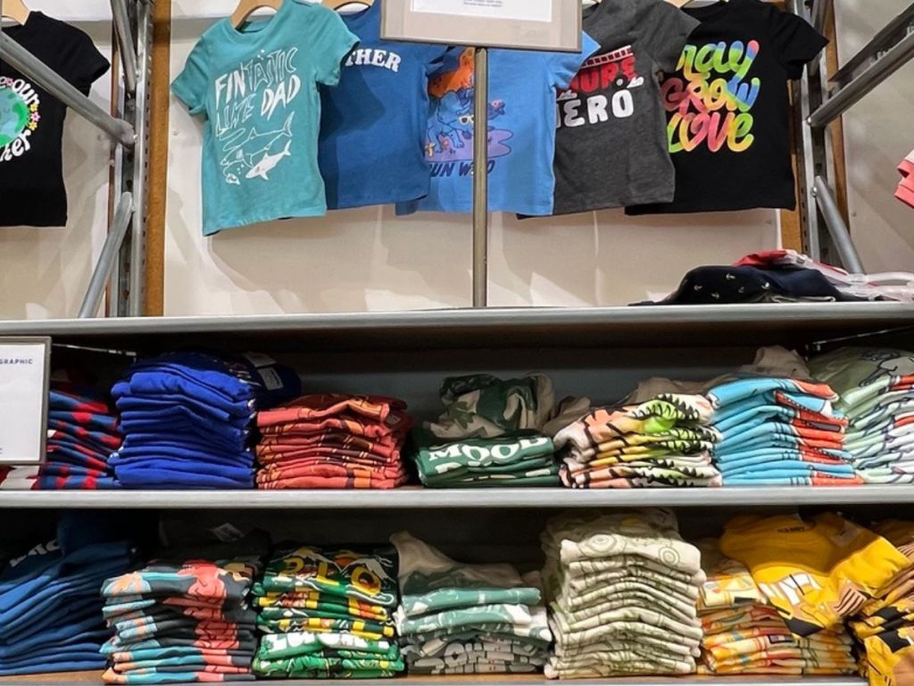 Wall of graphic tees for toddler boys at Old Navy
