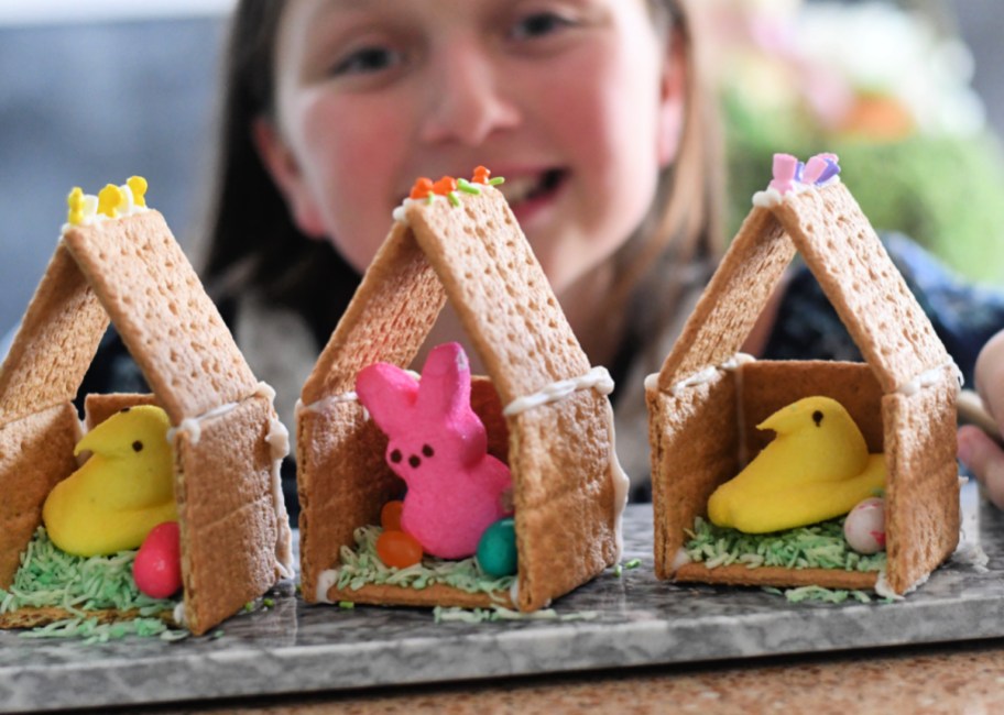 young girl with her diy peep house for Easter