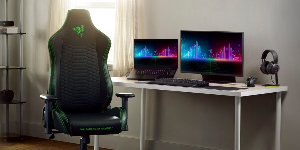 A computer desk with the Razer Iskur gaming chair which is one of the best gamer chairs of 2023