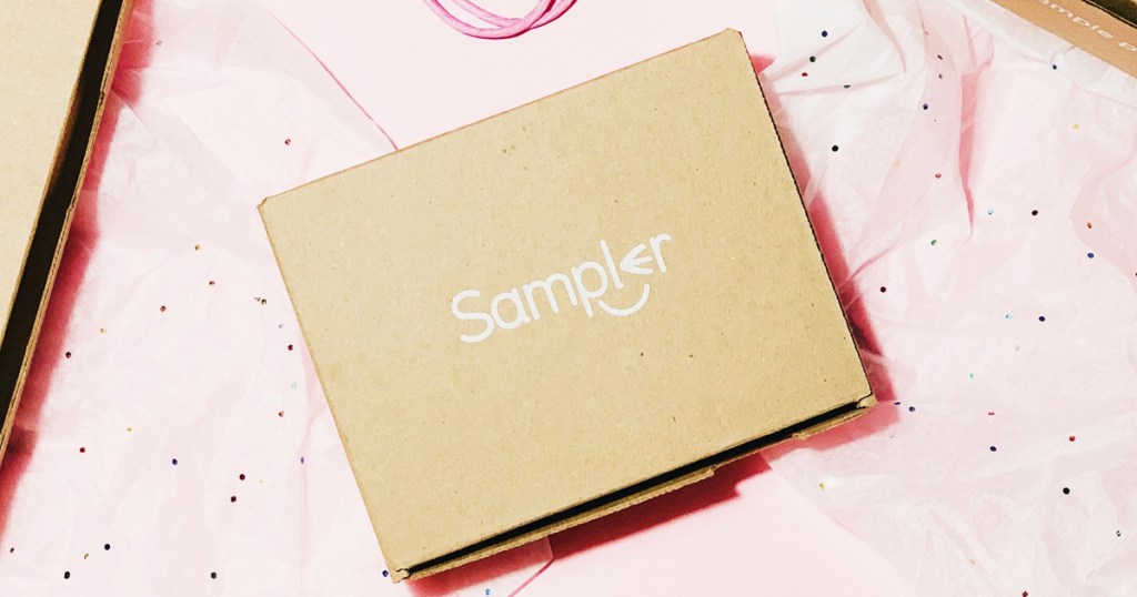 sampler cardboard box on top of pink tissue paper