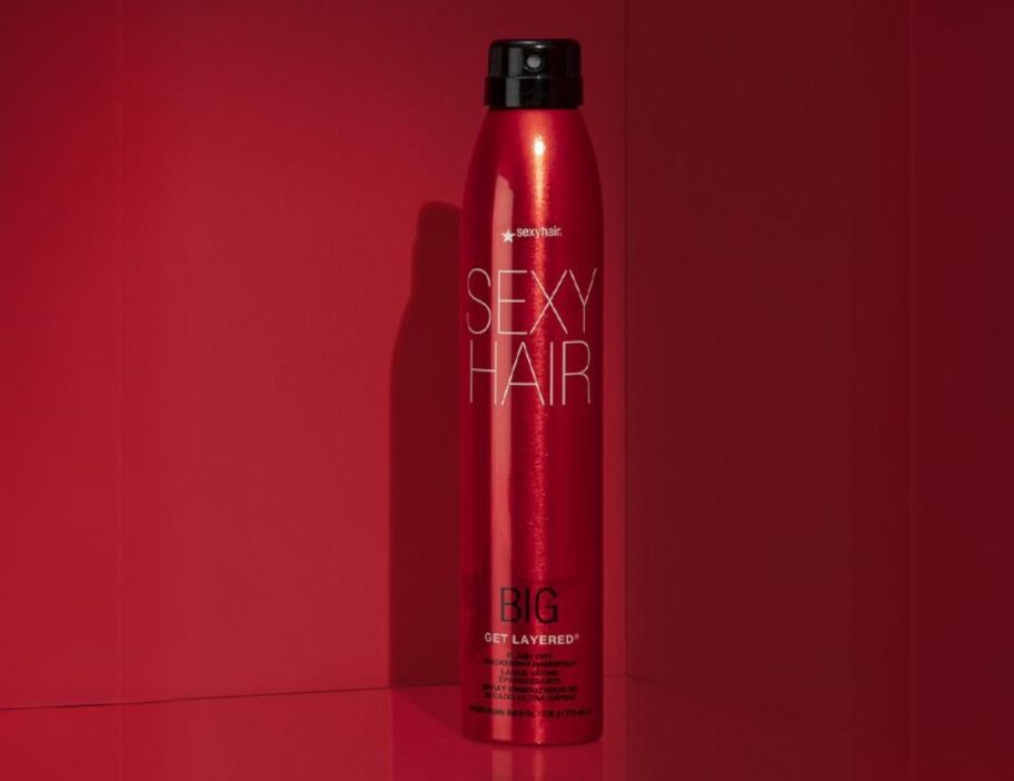 a red can of extra hold hair spray