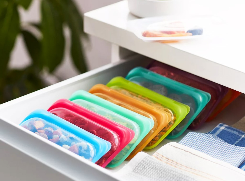 drawer full of stasher snack bags in a variety of colors