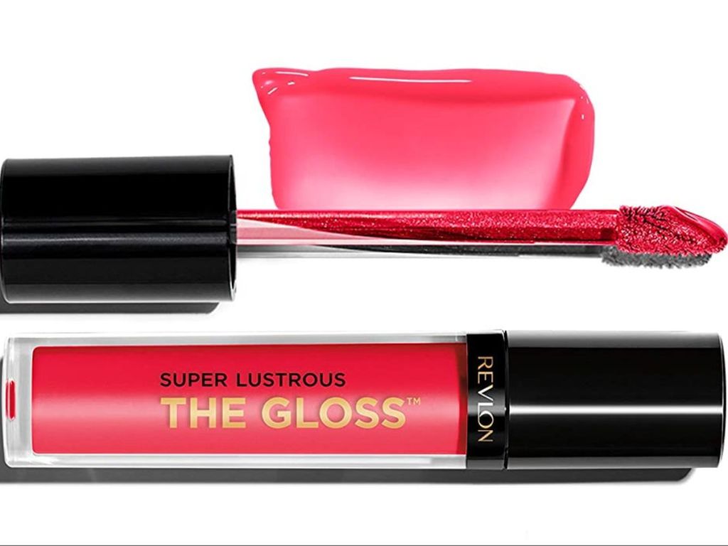 an open tube of red lip gloss 