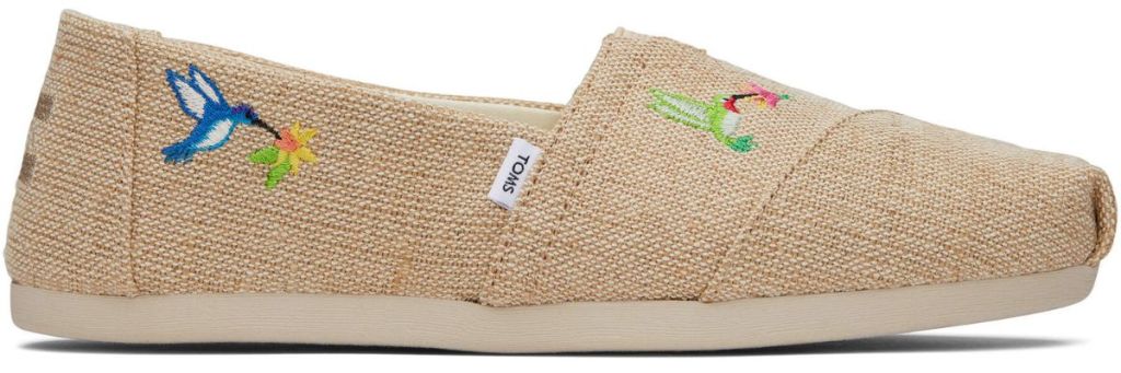 Toms tan canvas shoes with hummingbirds