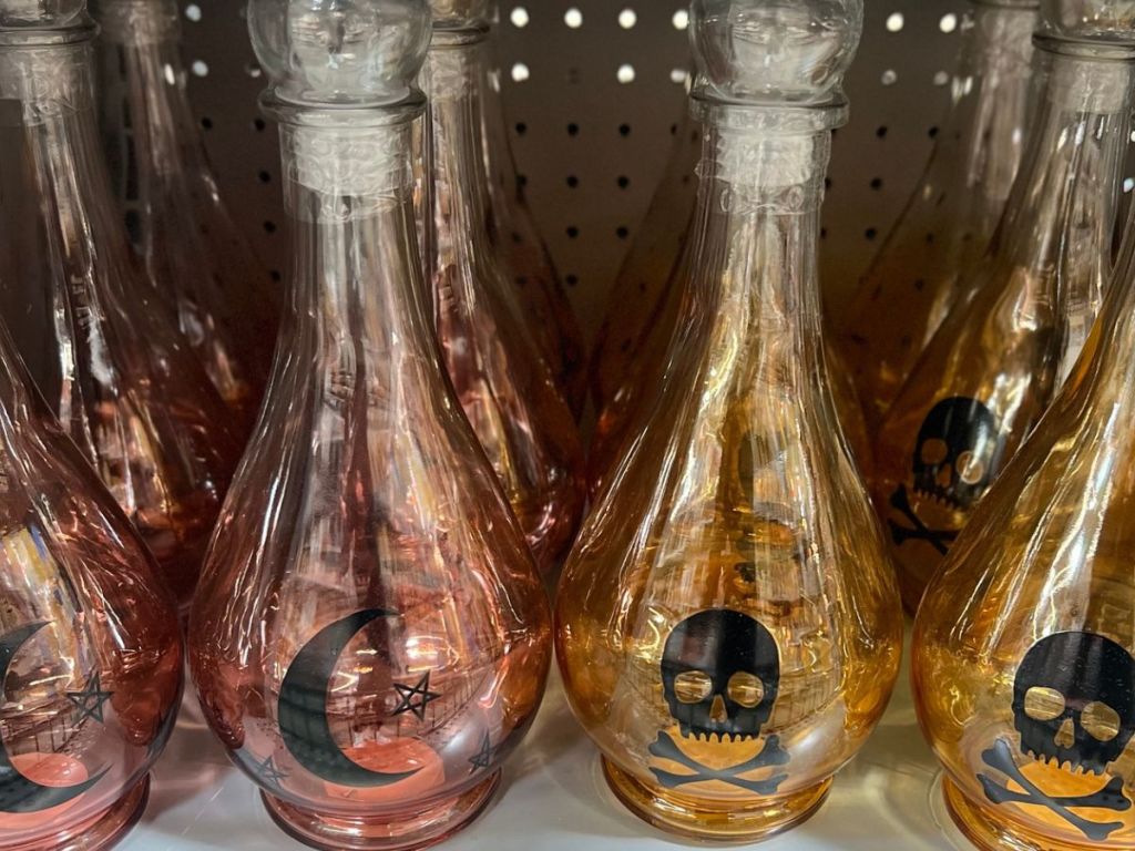 Shelf full of halloween potion bottles at Walmart