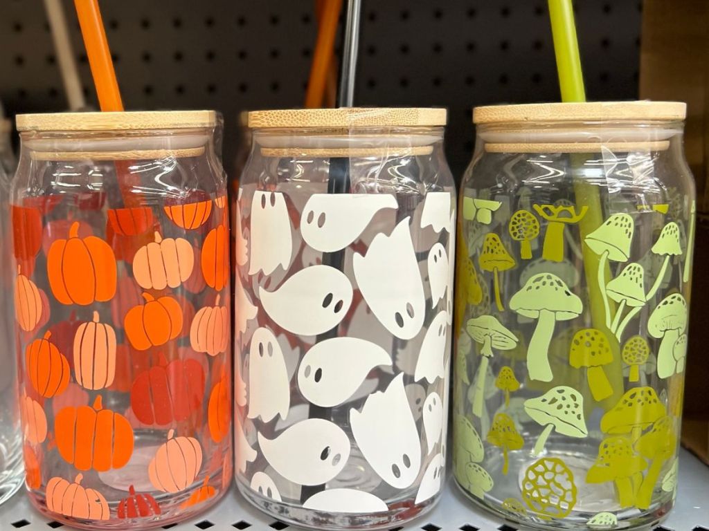 Shelf with Halloween theme glass tumblers with lid and straw