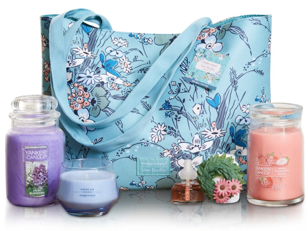 vera bradley blue tote surrounded by vera bradley themed candles and diffusers
