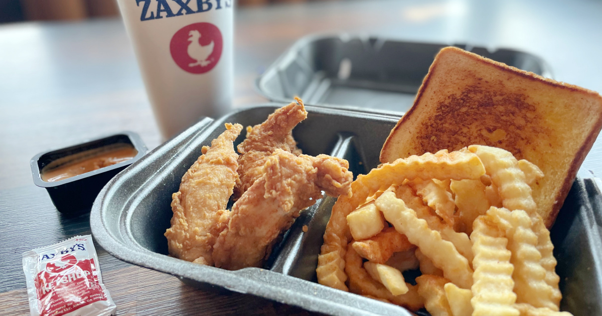 Zaxby's chicken meal with drink on table in restaurant