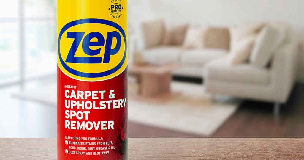 Zep Instant Spot and Stain Remover displayed with coaches in the background