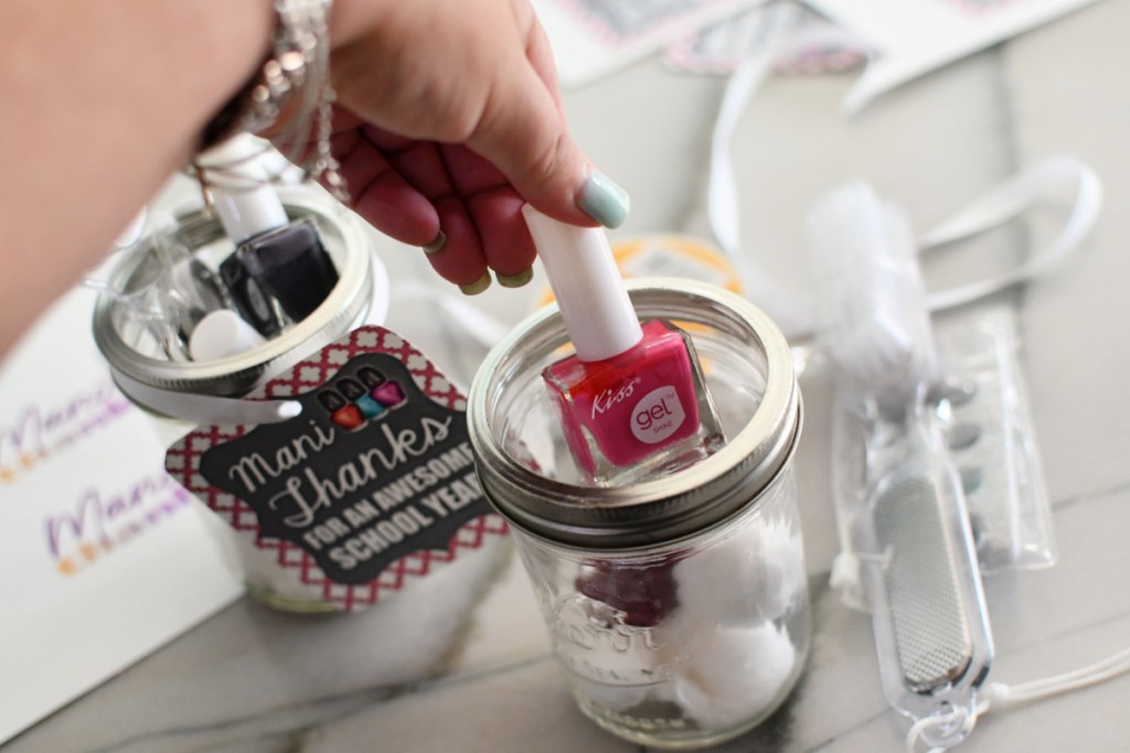 adding nail polish to a jar