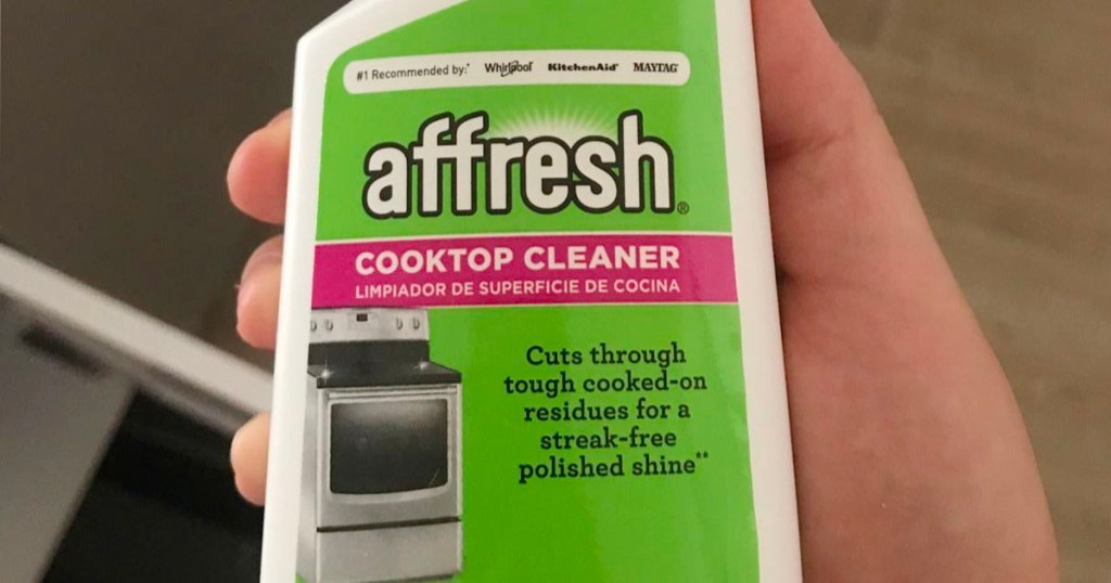 hand holding affresh cooktop cleaner