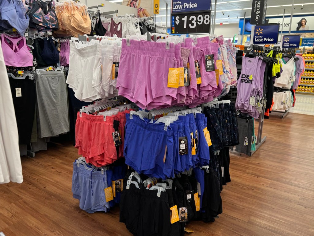 rack of womens gym shorts in multiple colors