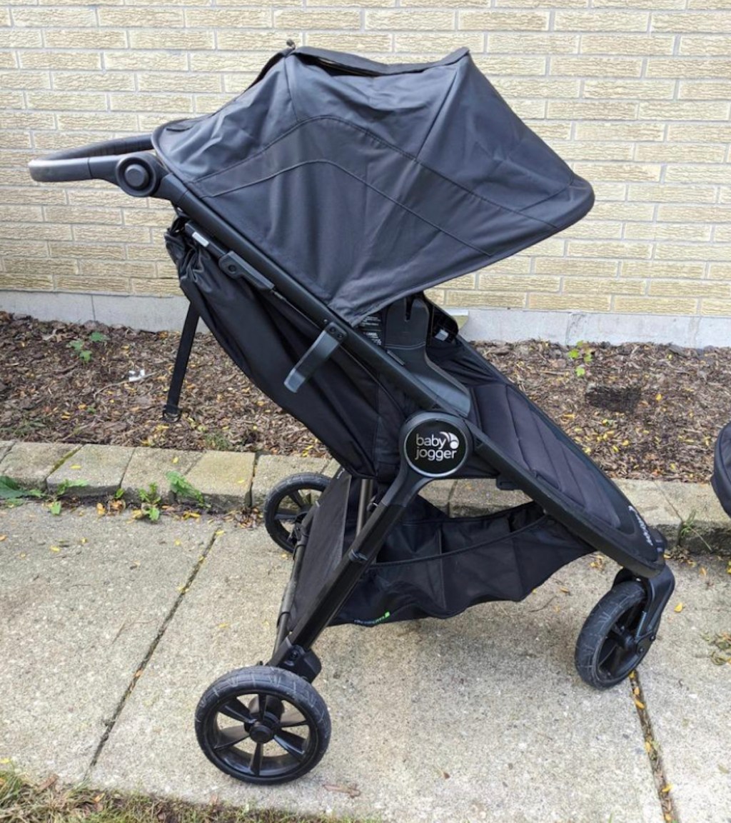 baby jogger stroller on sidewalk