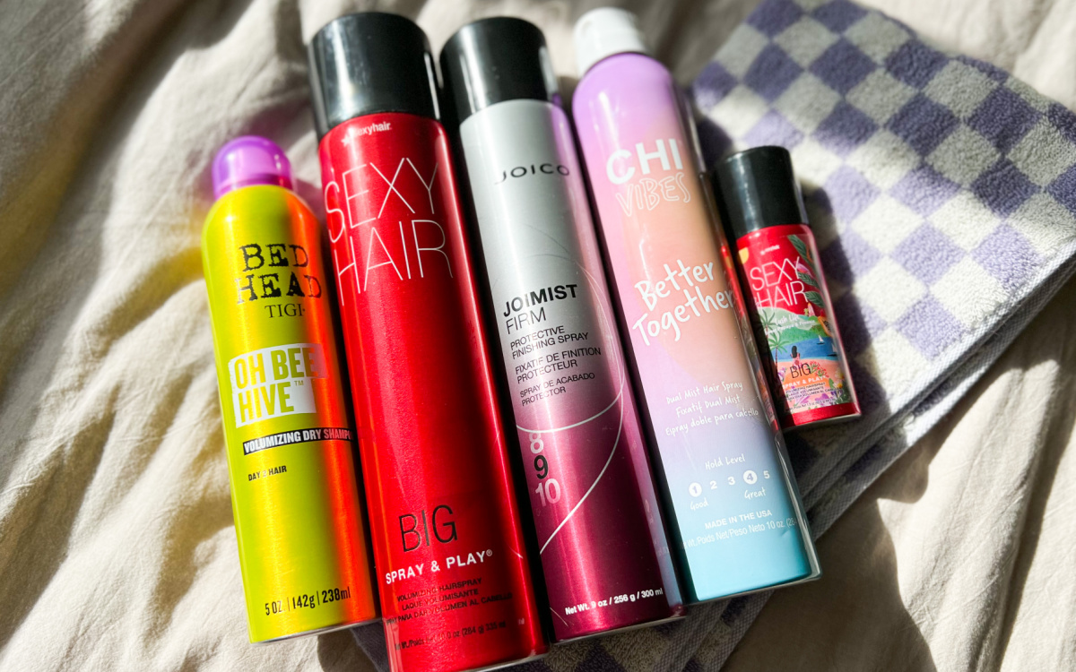 several hairsprays in a pile