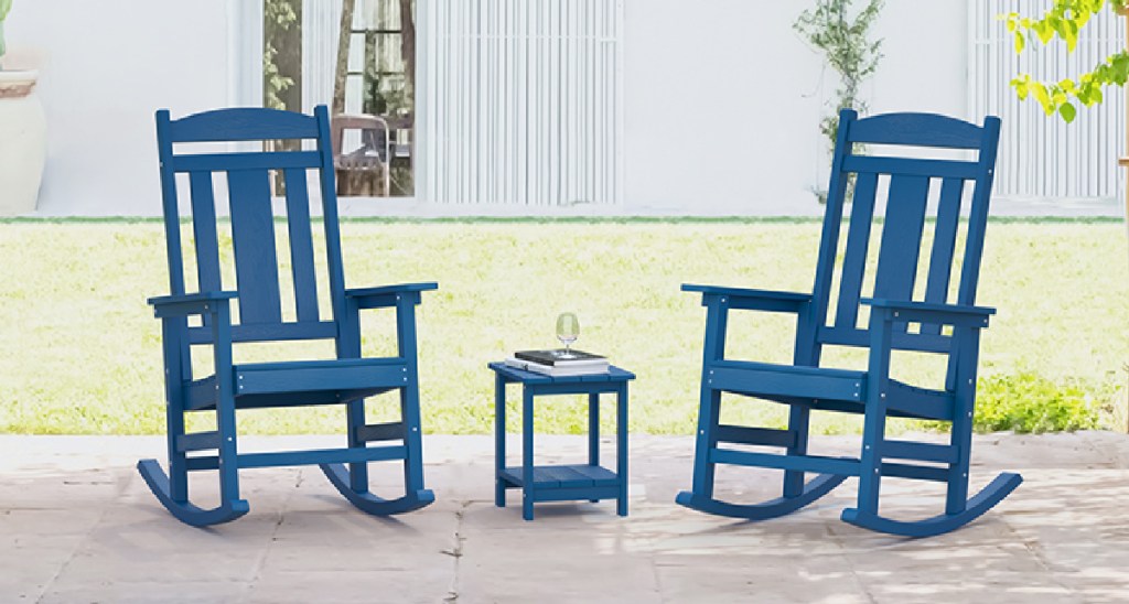 Two blue outdoor rocking chairs