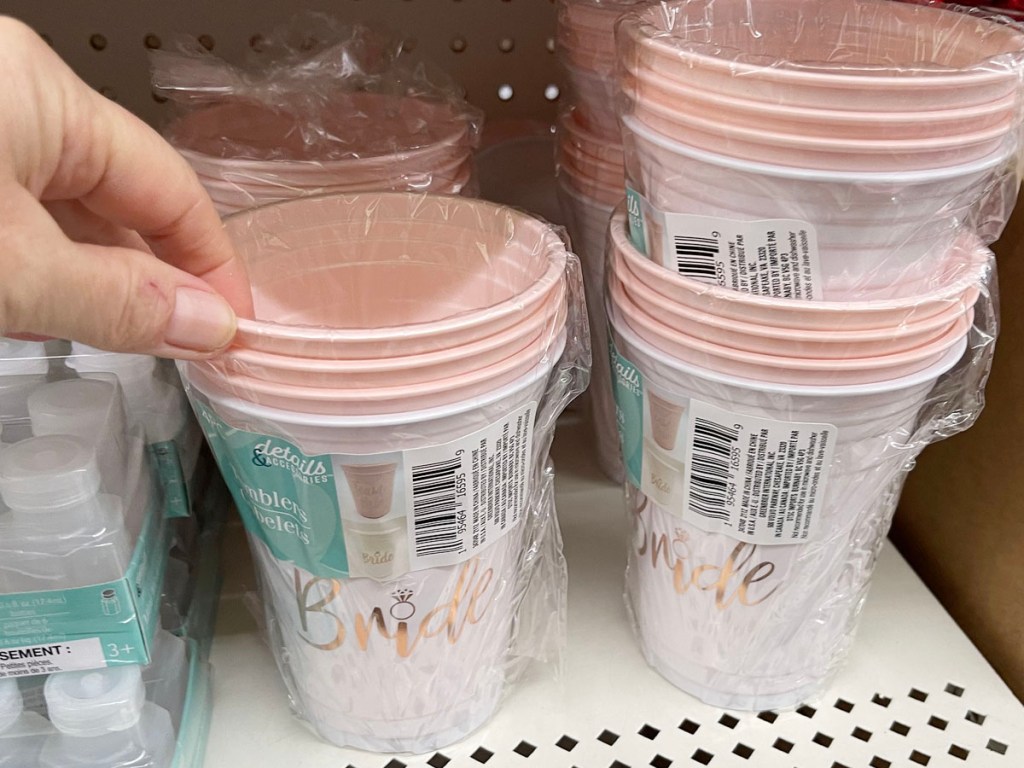 bride white and pink tumblers on shelf in dollar tree