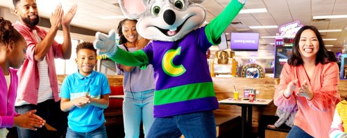 family with Chuck E. Cheese