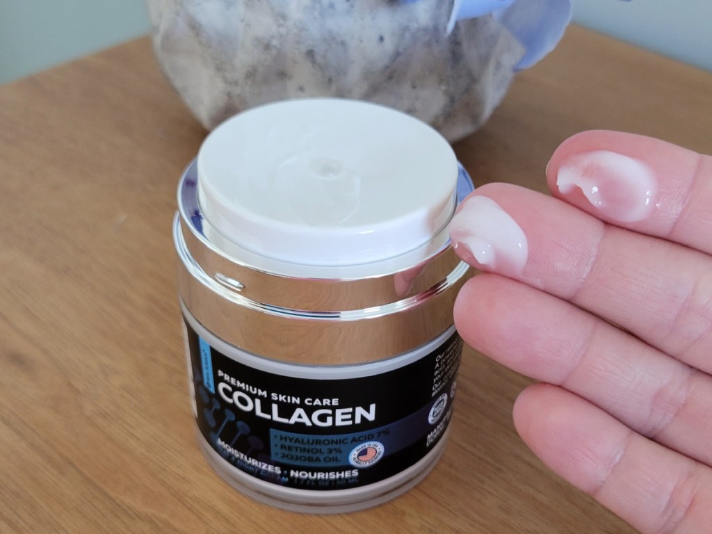 collagen cream squeezed out into woman's hands