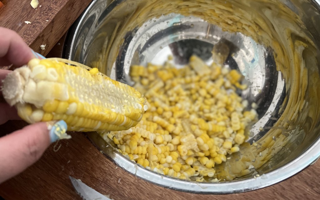 taking corn off the cob in bowl