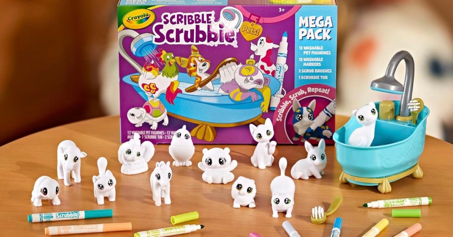 crayola scribble scrabble mega set box on table with pieces laid out in front of it