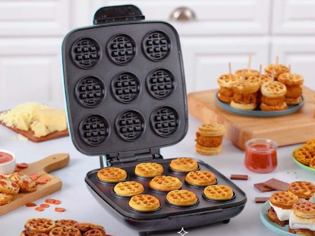 dash mini waffle maker surrounded by waffle sandwiches