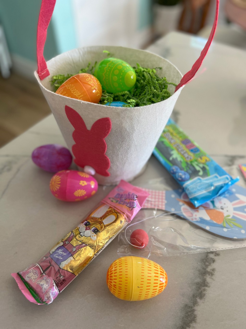 dollar tree basket with game and candy