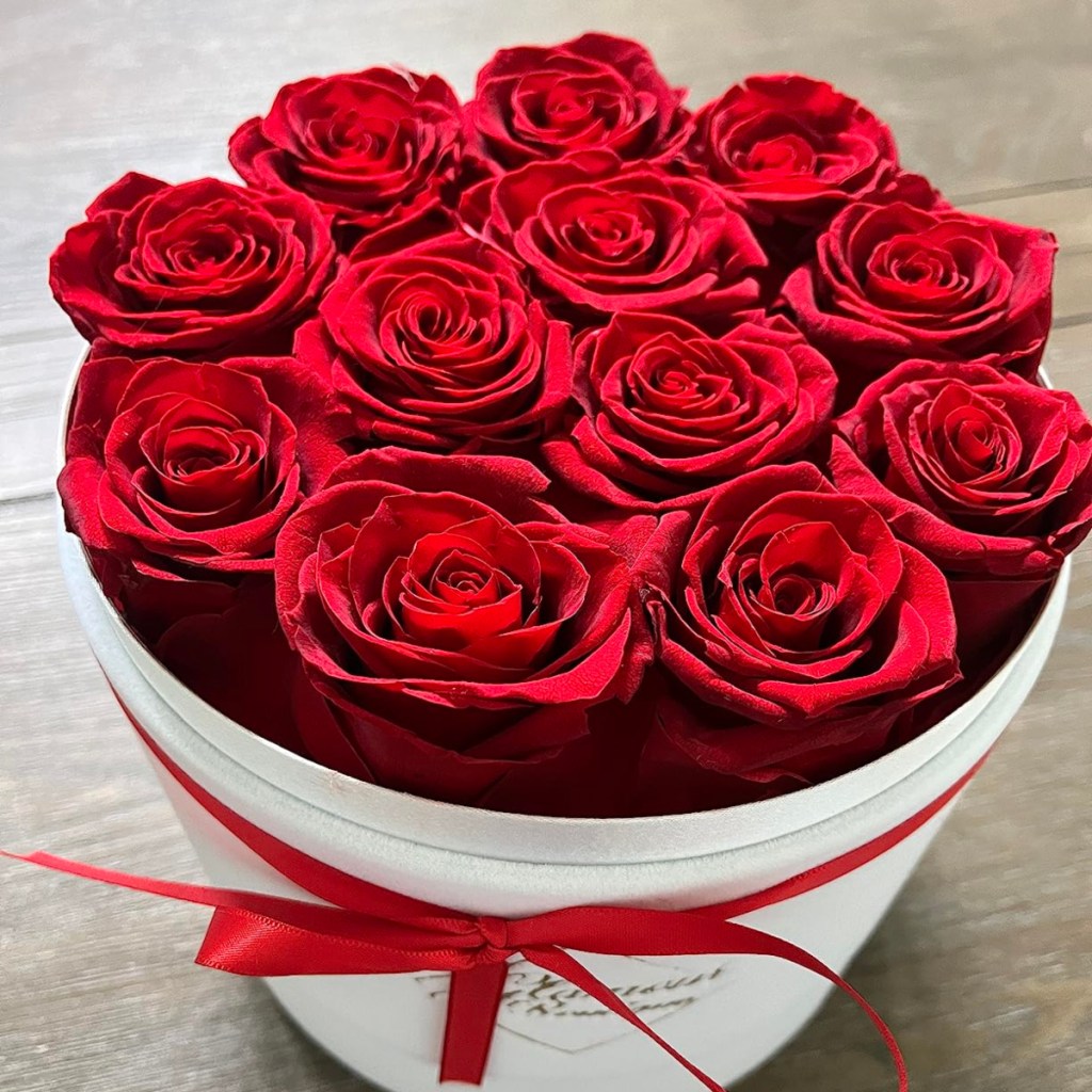 red roses in a white box