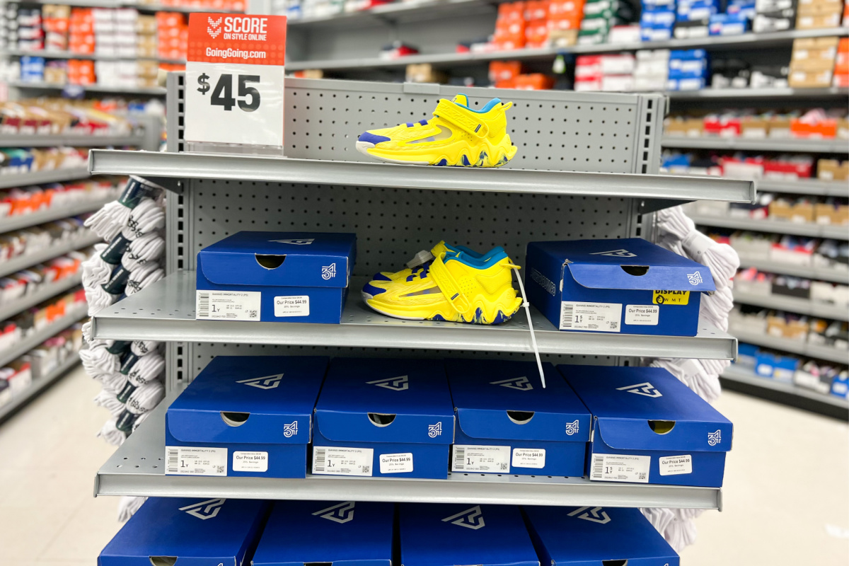 nikes in store on shelf with boxes