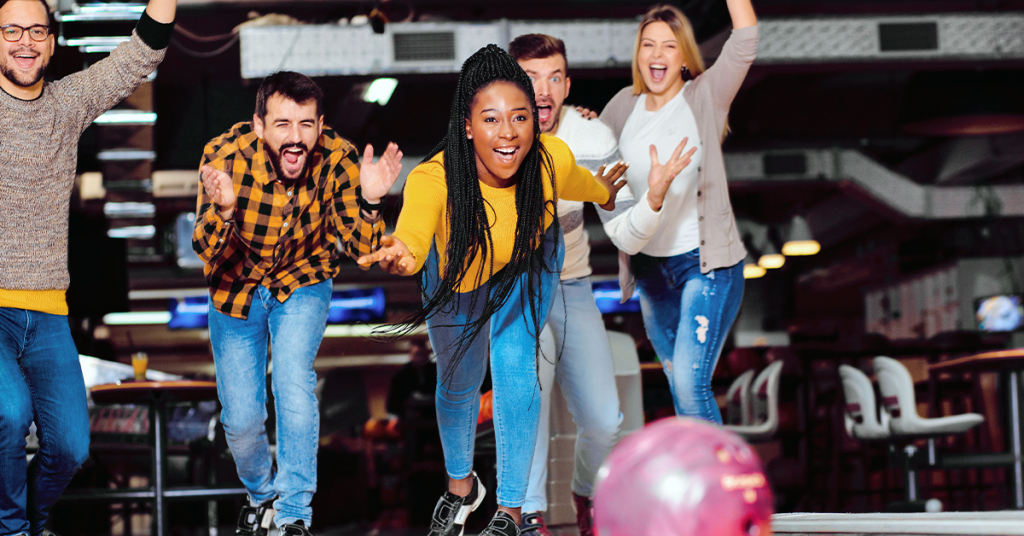 A group of people bowling for cheap thanks to Groupon