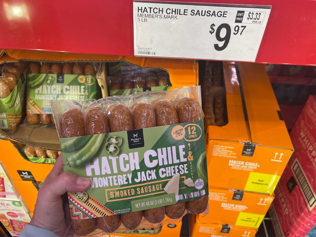 hand holding hatch chili sausage