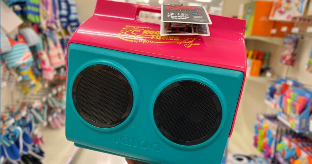 hand holding teal and pink kooltunes cooler