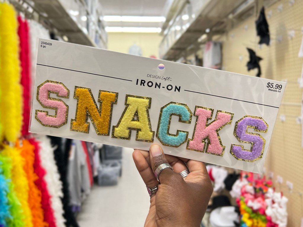 hand holding snacks iron on patches in hobby lobby